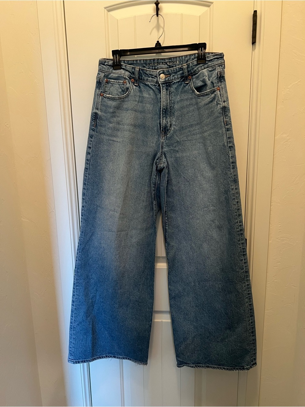 American Eagle Women’s High-Rise Ultra Wide Leg Jeans with Raw Hem. Size 10 Long